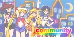 Sailor Moon, Sailor Jupiter, Sailor Venus, and Sailor Mercury from the 90s Sailor Moon anime title screen with the word Community written in rainbow coloured text