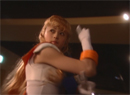 Sailor Venus from the live-action Pretty Guardian Sailor Moon PGSM TV series using a gold attack power.