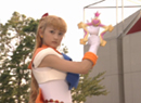 Sailor Venus holding her Star Tambourine weapon from the PGSM live-action Sailor Moon TV series.