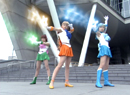 Sailor Jupiter, Venus, and Mercury from the live-action Sailor Moon TV series using their Star attacks.