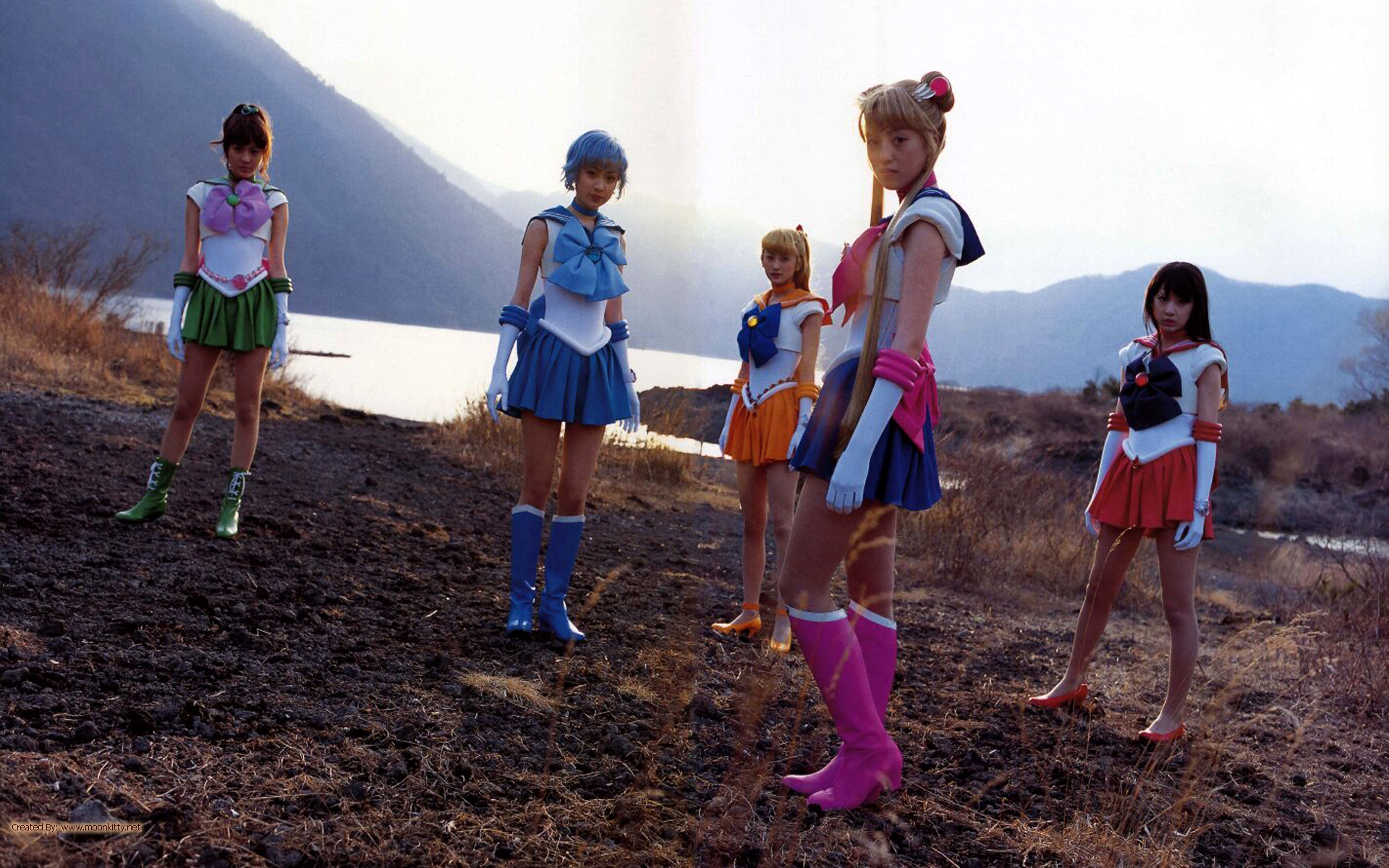 Sailor Moon, Mercury, Mars, Venus, and Jupiter standing on a cloud from the live-action Pretty Guardian Sailor Moon PGSM TV series.